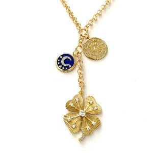 Gold Clover Pendant Necklace with Blue Charm
